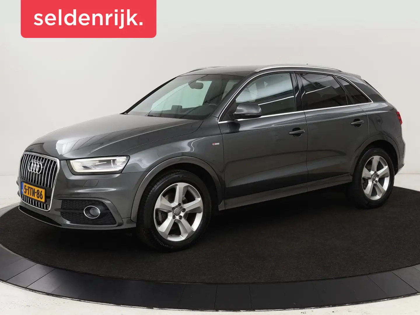 Audi Q3 1.4 TFSI Sport Ed. | Trekhaak | Leder/Alcantara | Grijs - 1