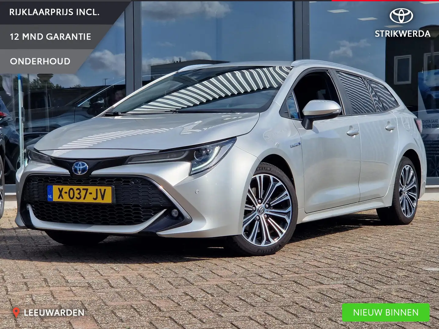 Toyota Corolla Touring Sports 2.0 Hybrid Dynamic Grijs - 1