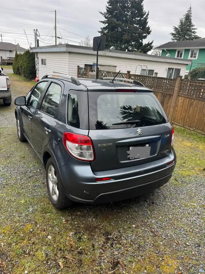 Suzuki SX4 снимка Suzuki SX4