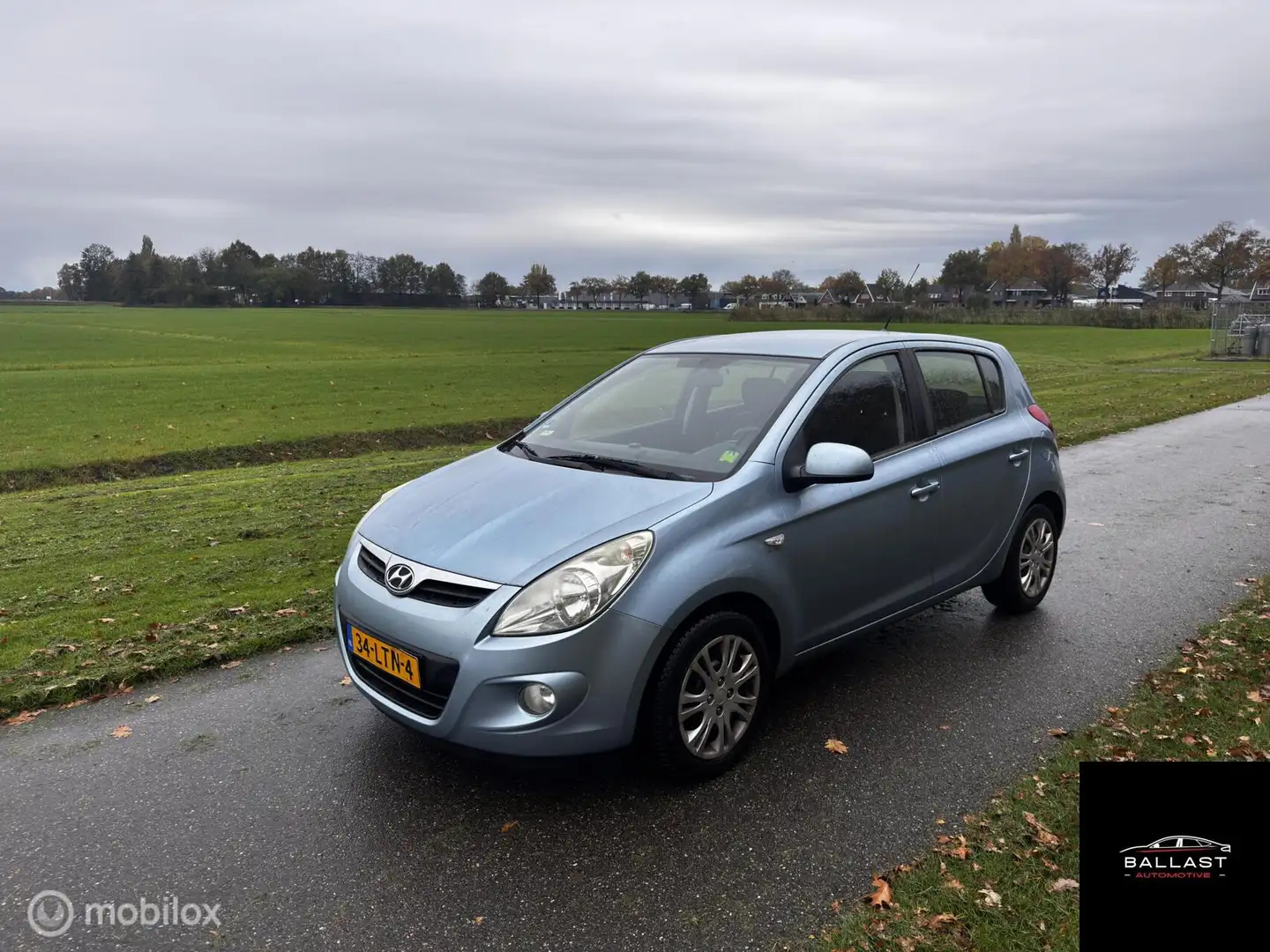 Hyundai i20 1.2i DynamicVersion Blauw - 1