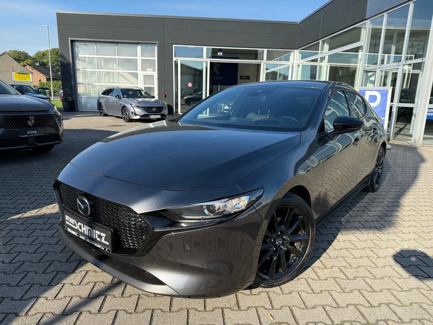 Mazda 3 Homura Gris - 1
