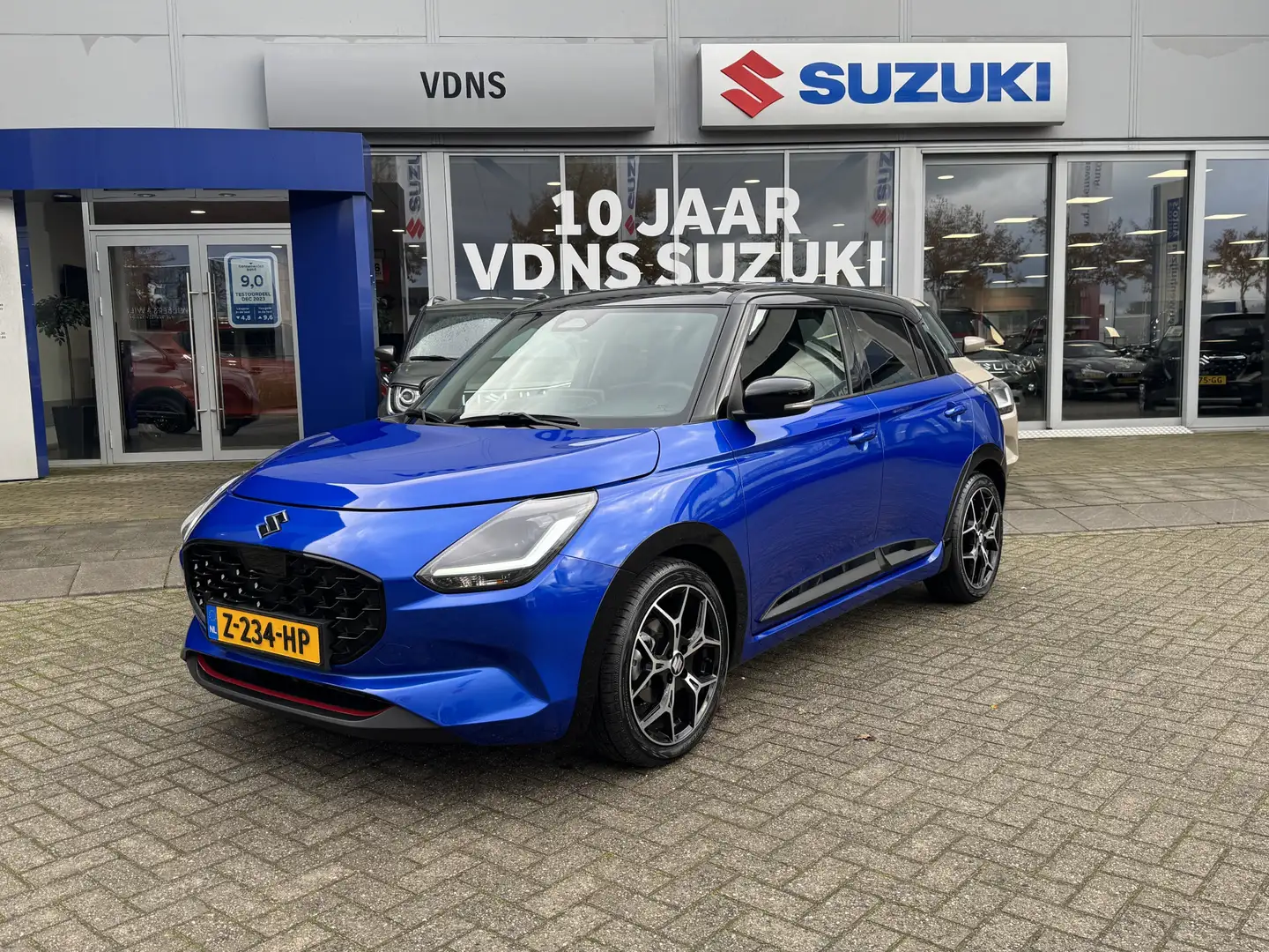 Suzuki Swift 1.2 Style Smart Hybrid Demo BTW accessoirespakket Bleu - 1
