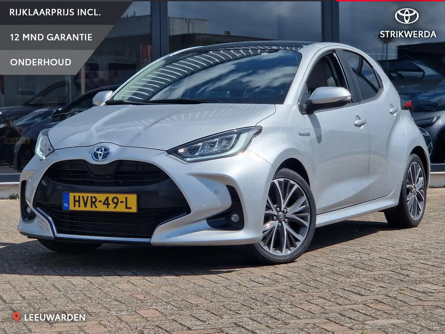Toyota Yaris 1.5 Hybride Executive Panoramadak Trekhaak volledi Gris - 1