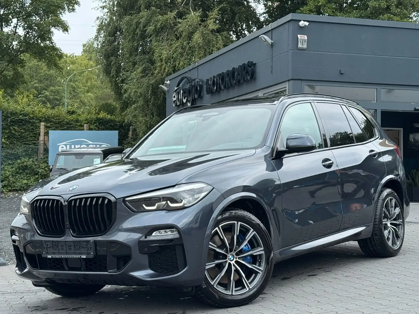 BMW X5 xDrive 30 d Aut. 1 Hand - M Sportpaket /// Grau - 1