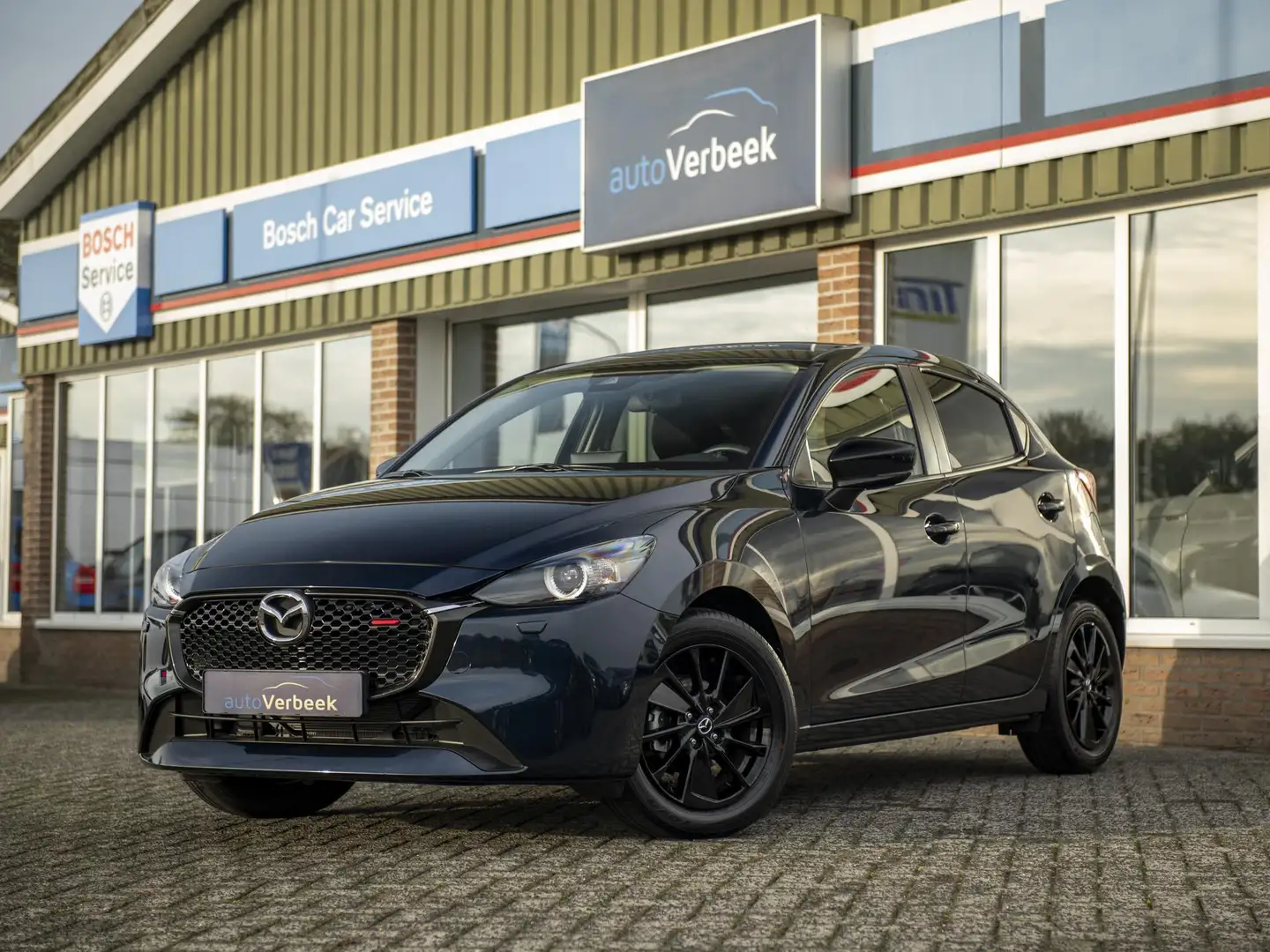 Mazda 2 1.5 SA-G 90pk Aut. Homura | Camera | Apple Carplay Blauw - 1