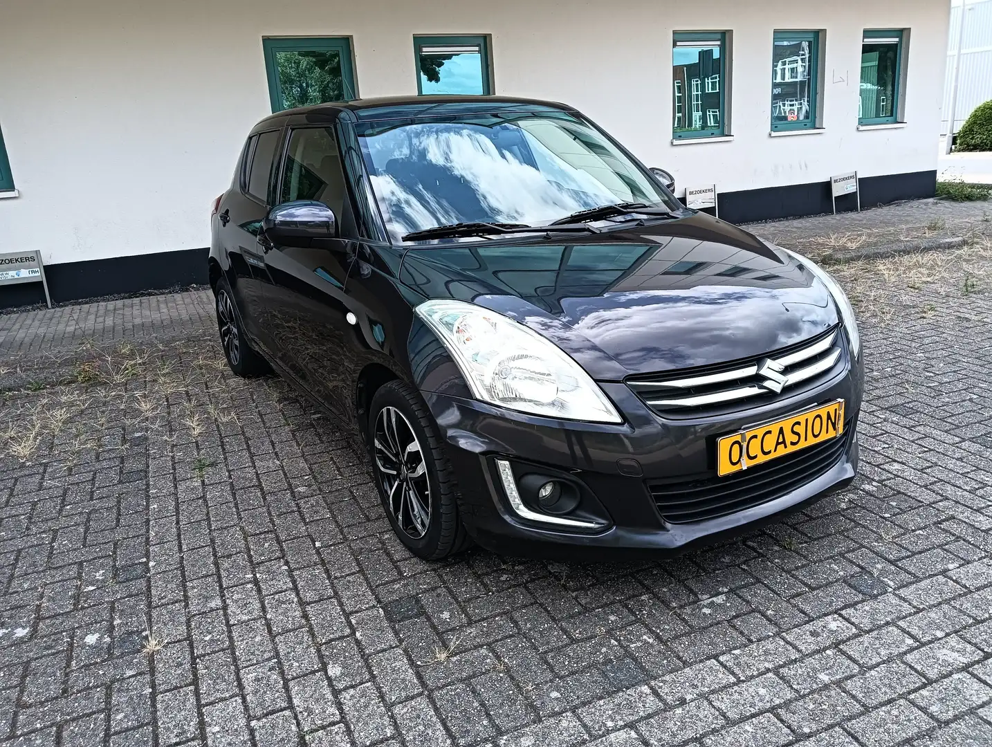 Suzuki Swift STYLE. navigatie. cruise control. stoelverwarming. - 1