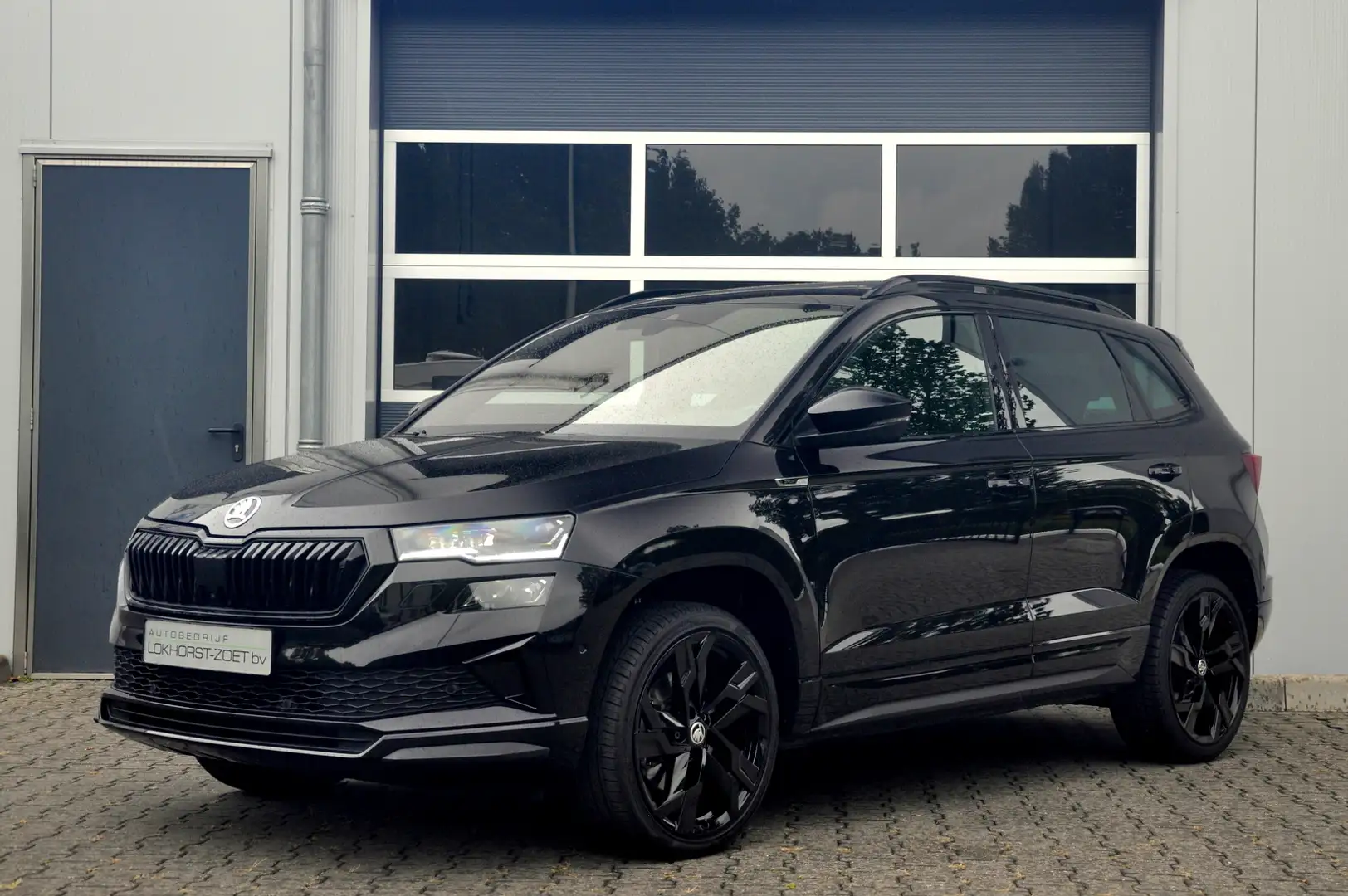 Skoda Karoq 1.5 TSI ACT Sportline Business Automaat | Pano | A Noir - 1