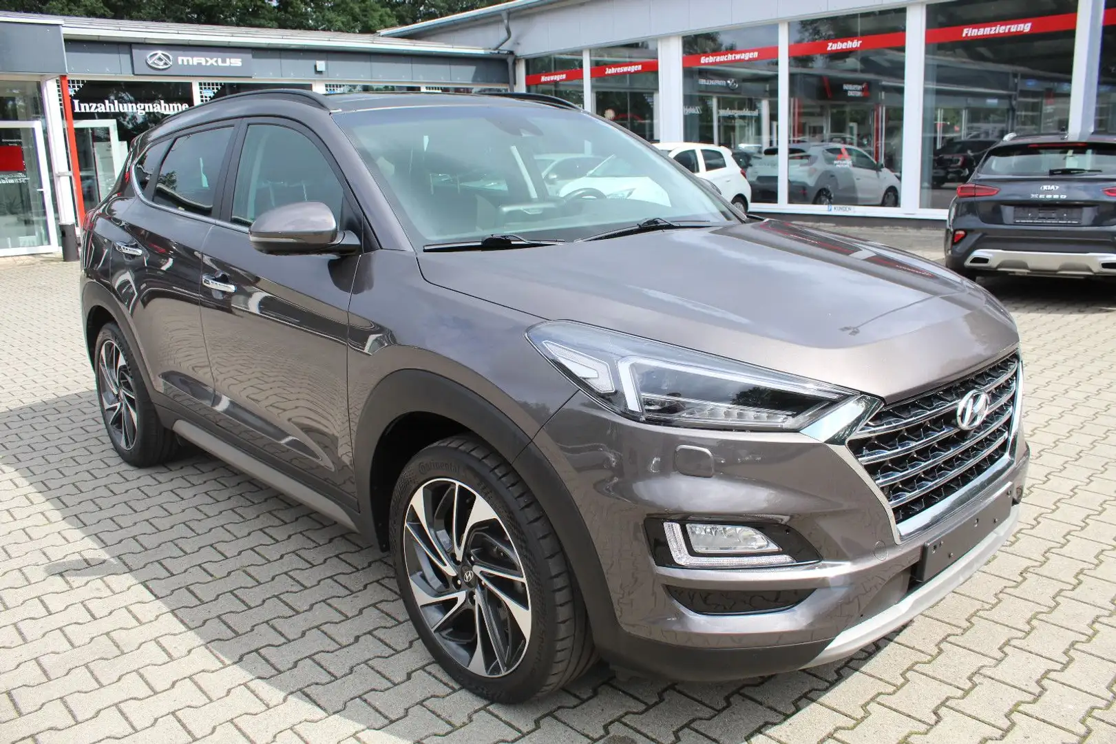 Hyundai TUCSON 1.6 TGDI Premium 2WD Automatik (PANO) Braun - 1