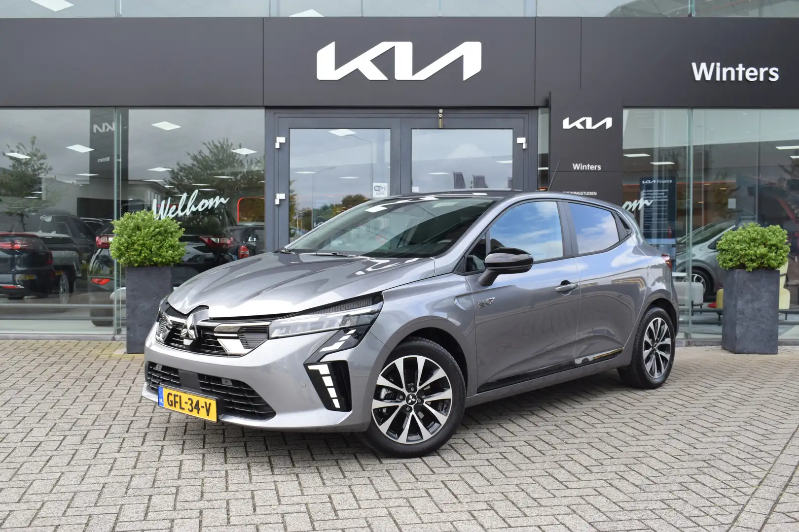 Mitsubishi Colt 1.6i HEV/Hybrid Intense Autom. | Climate Control | Grijs - 1