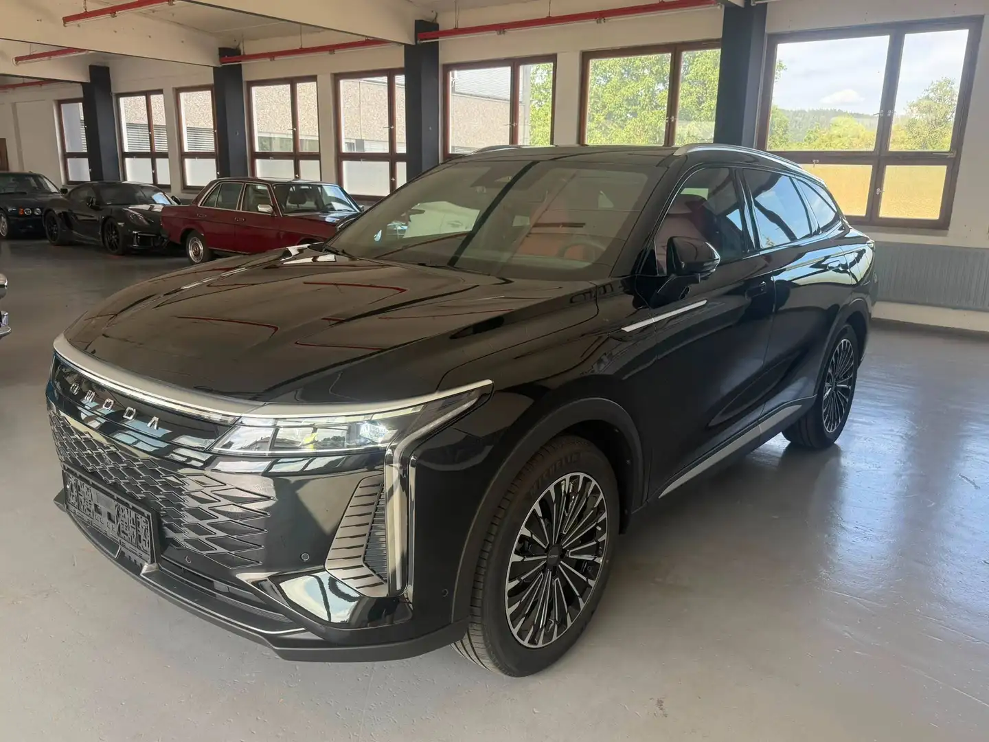 Omoda 9 1.5 PHEV Premium Line Schwarz - 1