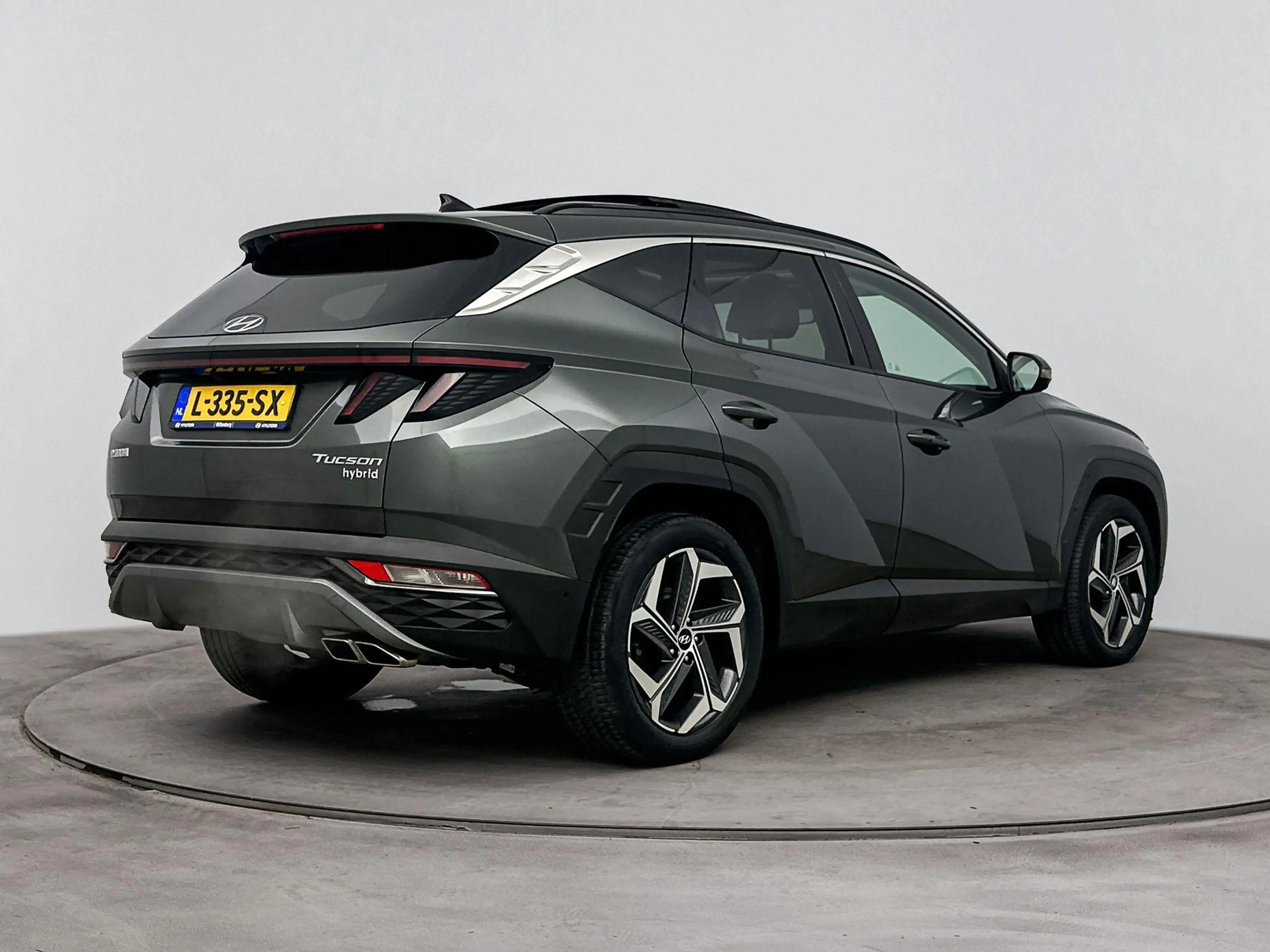 Hyundai TUCSON 1.6 T-GDI HEV Premium Sky | Schuif kanteldak | Sto — photo 2
