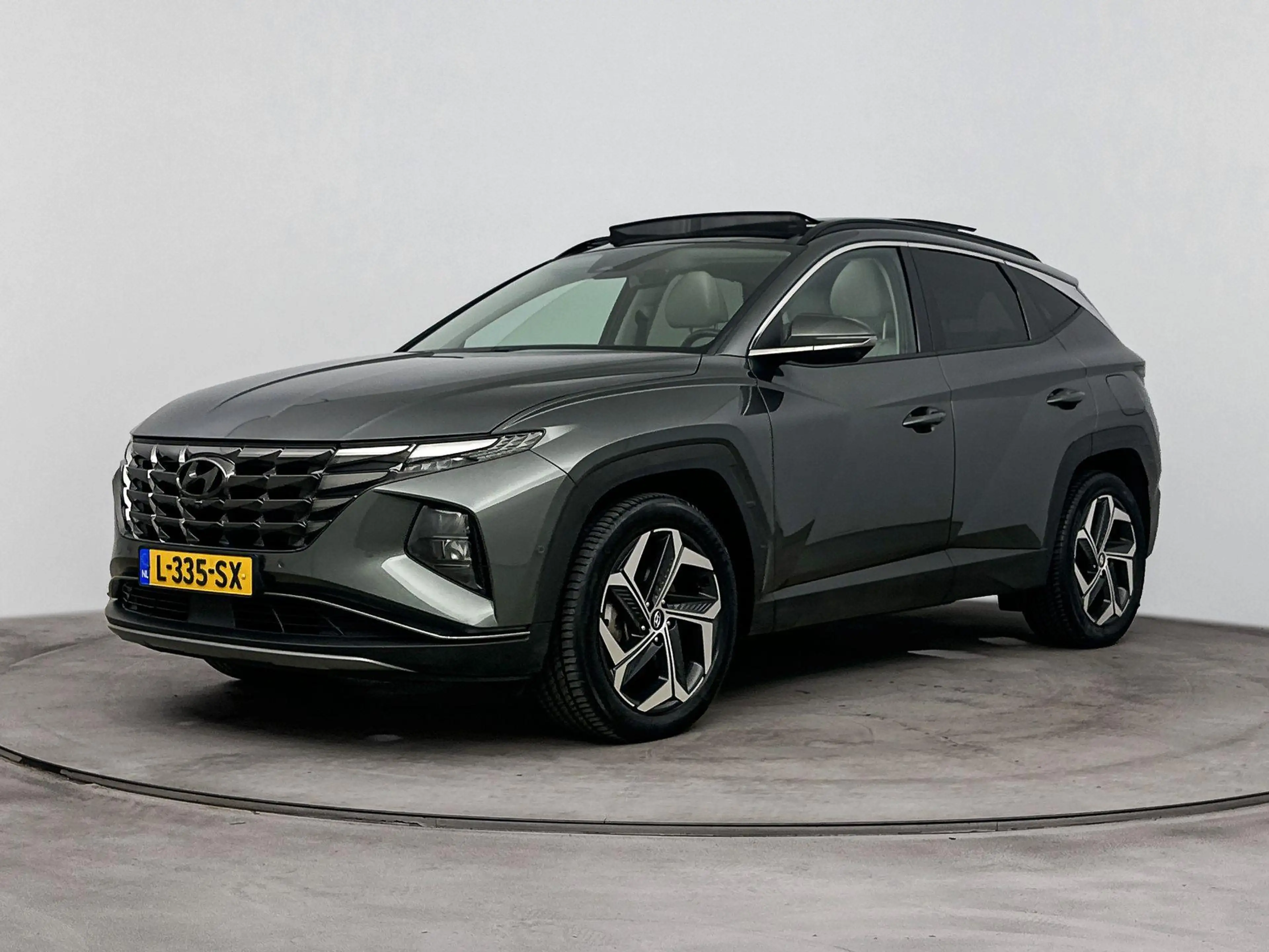 Hyundai TUCSON 1.6 T-GDI HEV Premium Sky | Schuif kanteldak | Sto — photo 10