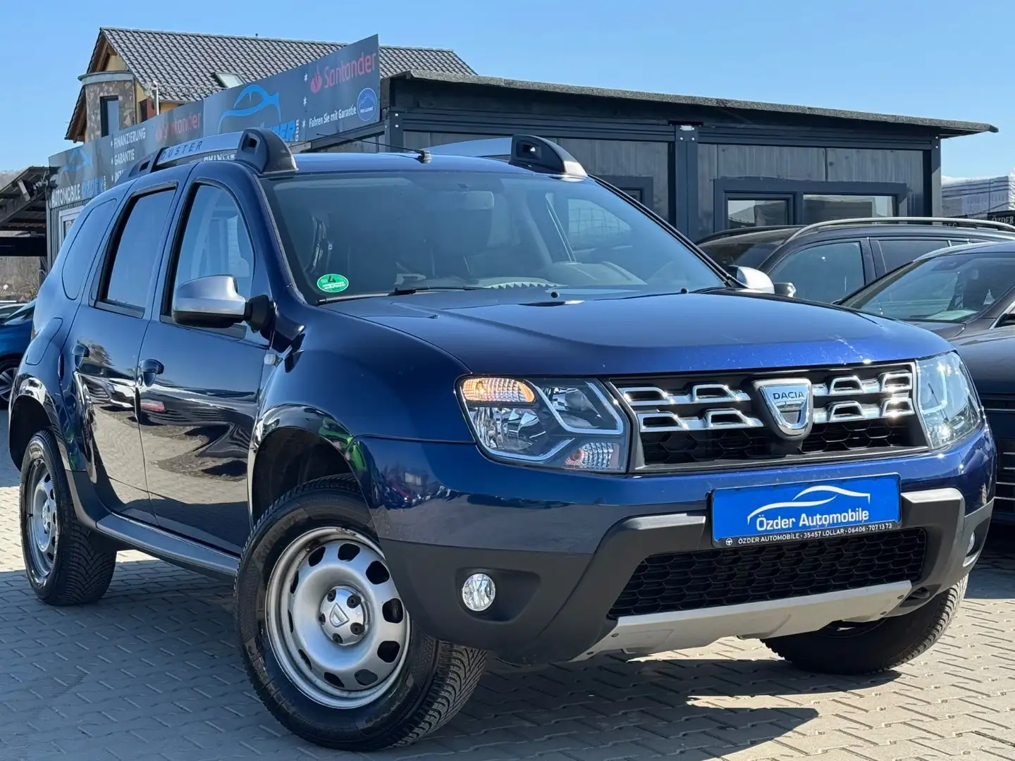 Dacia Duster 1.6 SCe Laureate 4x2+Finanzierung+1.Hand+ Blau - 1
