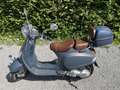 Vespa LXV 125 vendu avec 2 casques et une cape Bleu - thumbnail 1