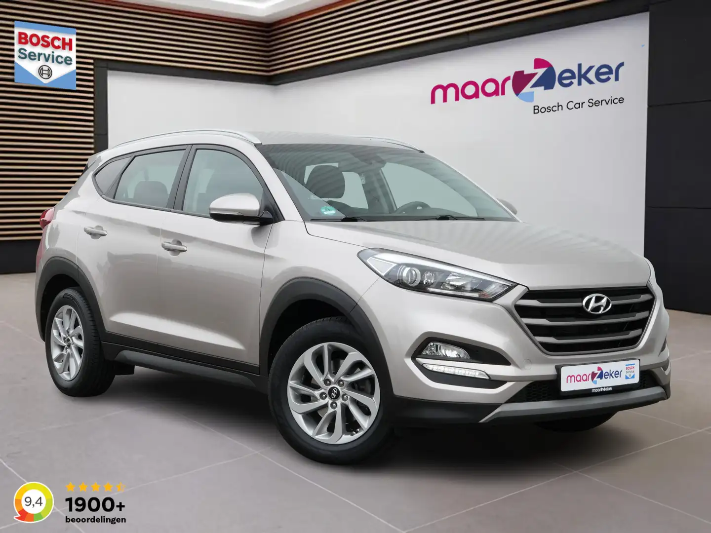 Hyundai TUCSON 1.6 T-GDI Comfort ✅Dodehoek✅Stoelverw.✅Camera✅Lane Grijs - 1