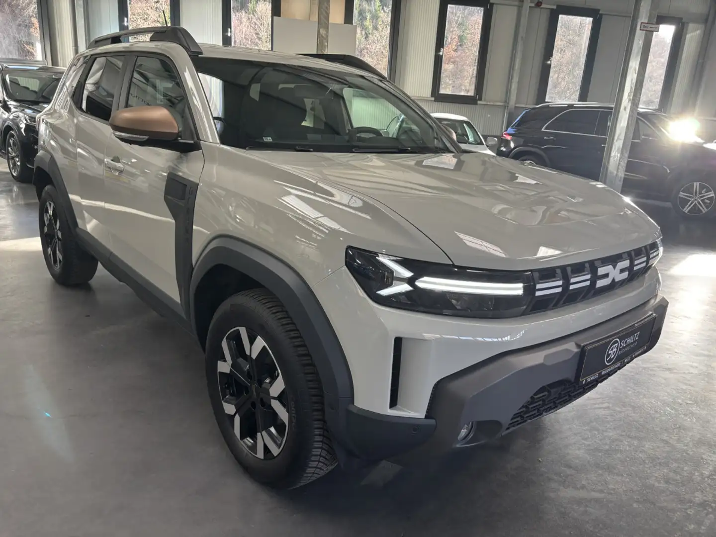 Dacia Duster 1.2 TCe MildHybride EXTREME 4x4 Beige - 1