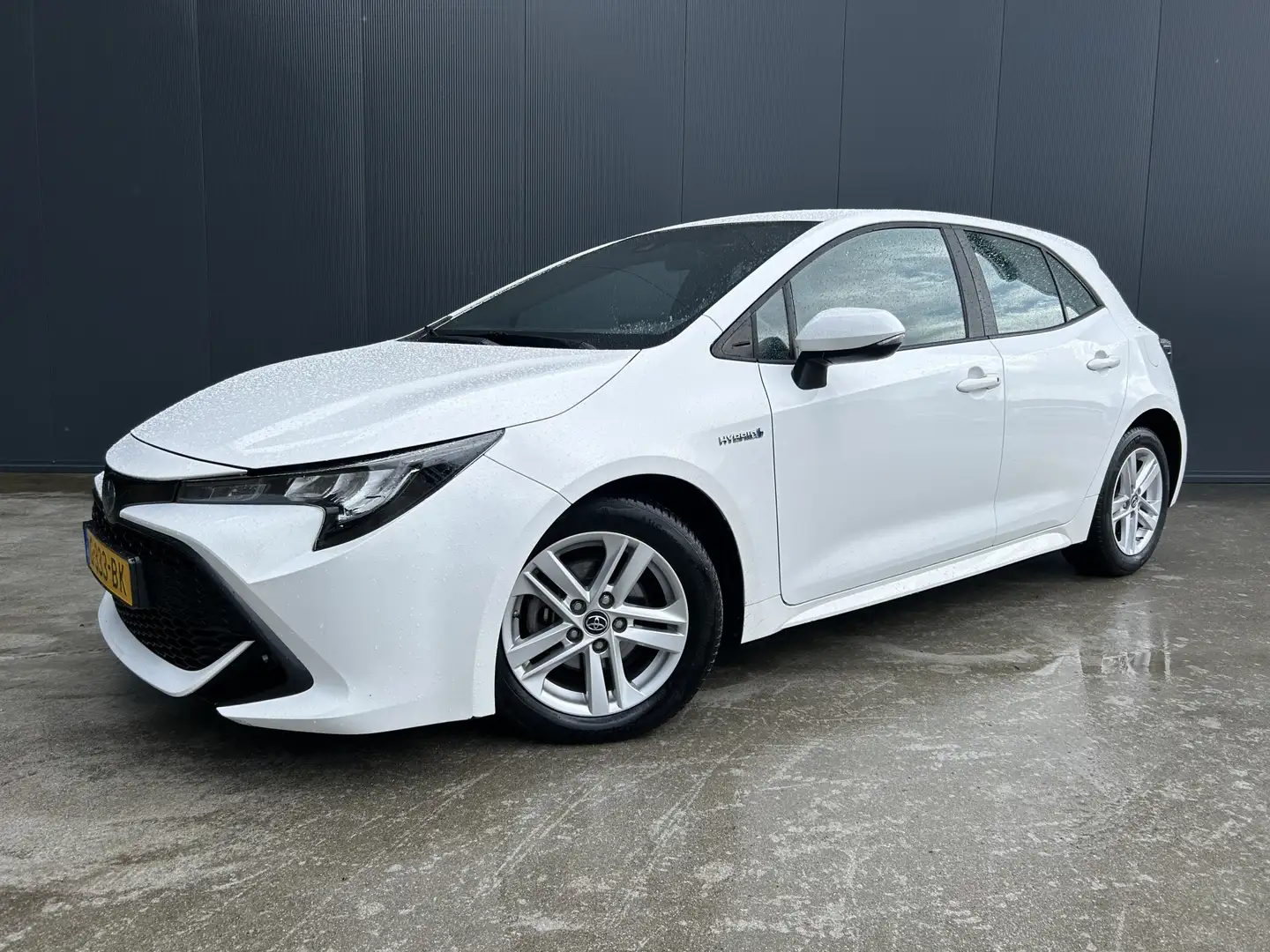 Toyota Corolla 1.8 Hybrid Active 1e EIGENAAR CAMERA LED NAVI CRUI Wit - 1