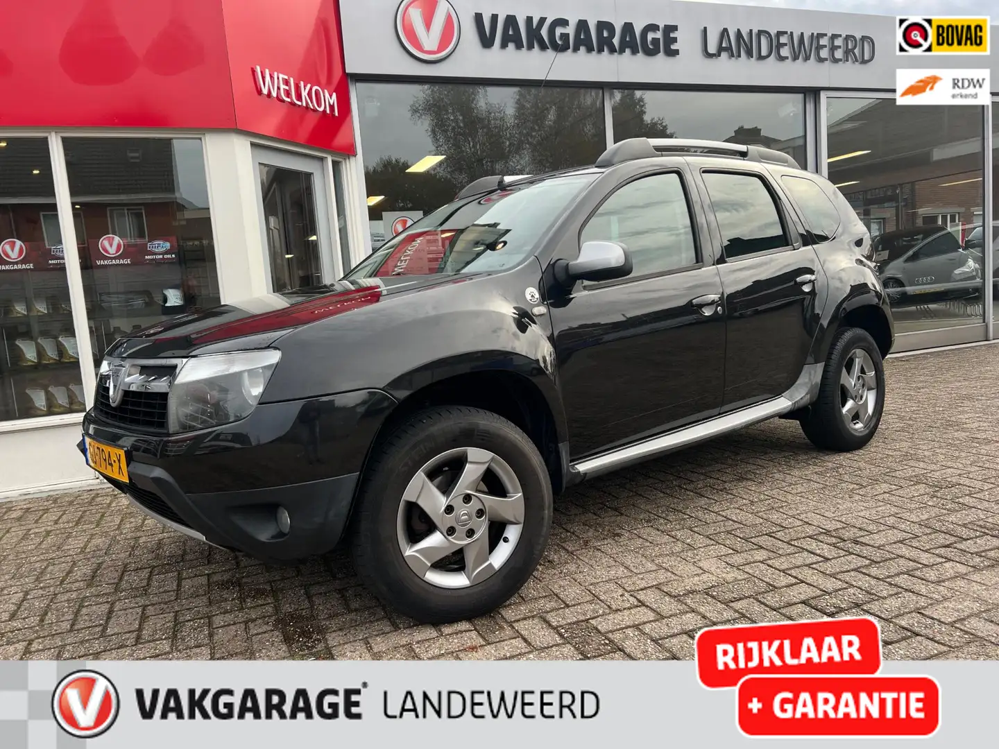 Dacia Duster 1.6 Prestige 2wd, AIRCO, TREKHAAK, LEDER, PDC Zwart - 1