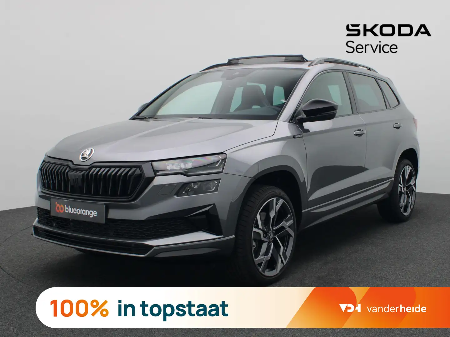 Skoda Karoq 1.5 TSI ACT Sportline Business 150PK DSG Pano-Schu Grijs - 1