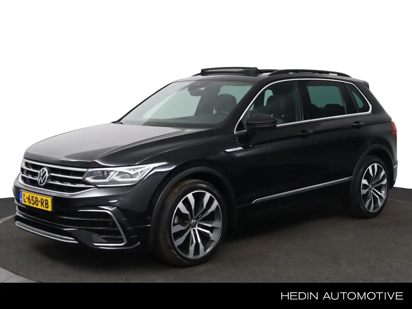 Volkswagen Tiguan 1.5 TSI R-Line | Navigatie | Adapt. Cruise Control Zwart - 1