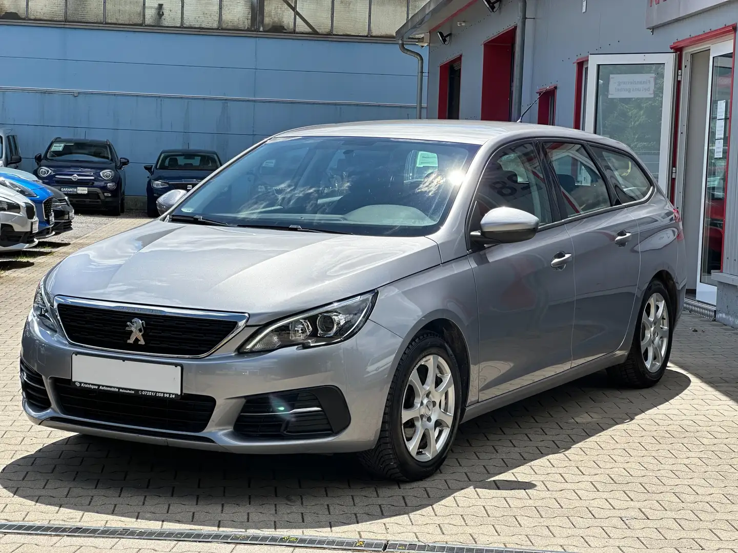 Peugeot 308 SW 1.5 BlueHDI*TüV Neu*AHK*Navi*Tempo*Klimaauto Grau - 1