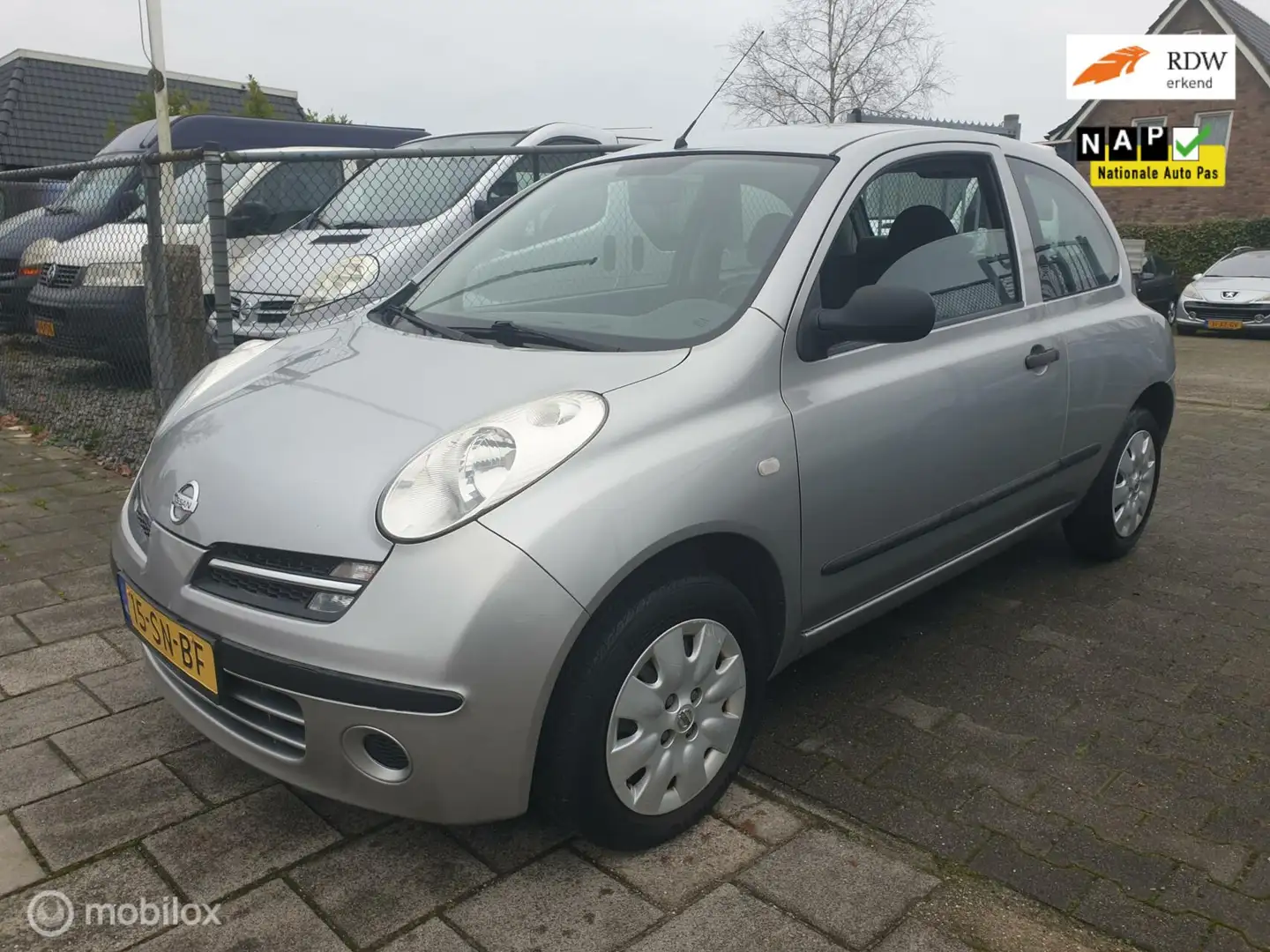 Nissan Micra 1.2 Visia airco 157499 km nap Grijs - 1