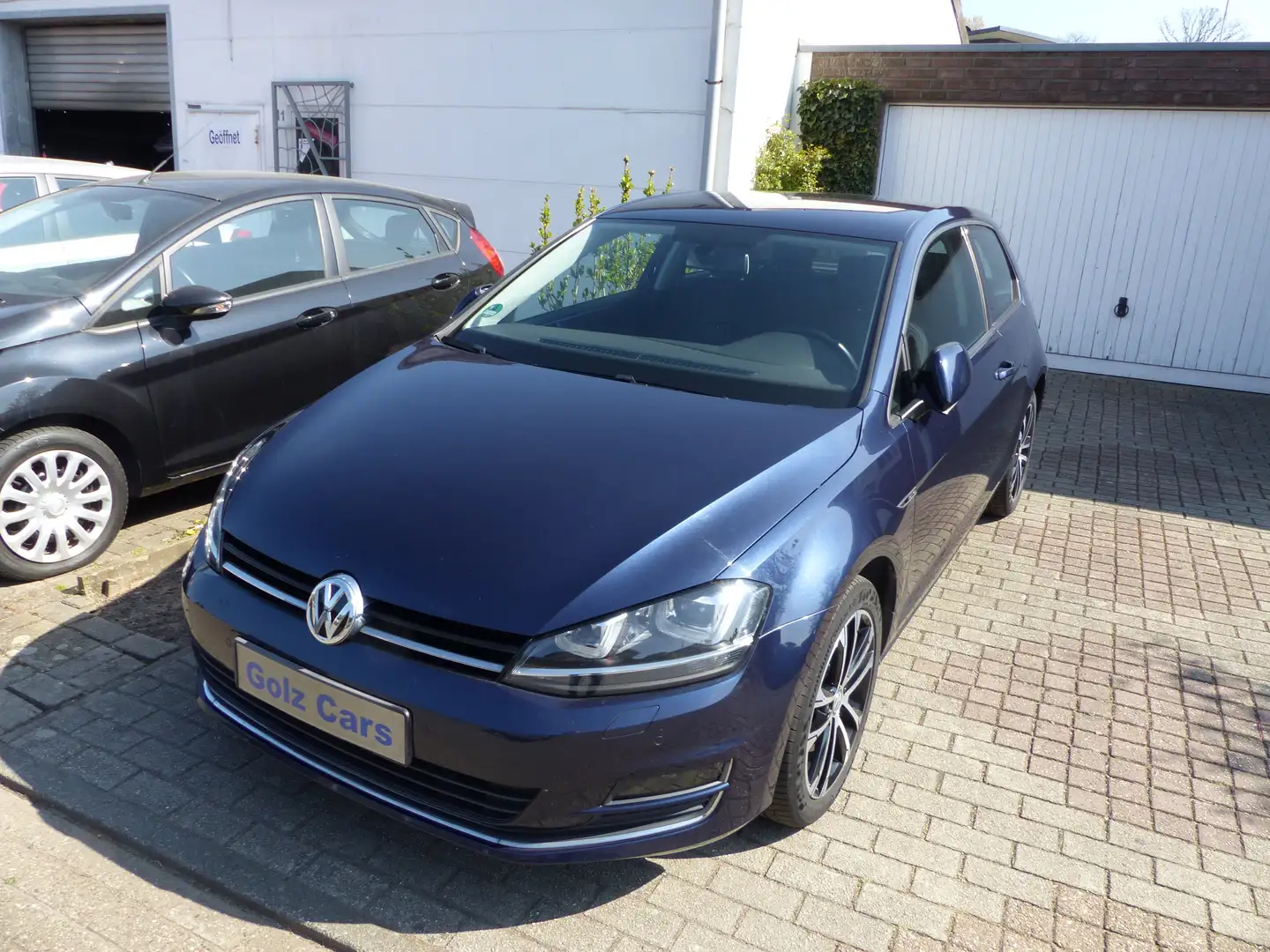 Volkswagen Golf Lounge BMT Blauw - 1