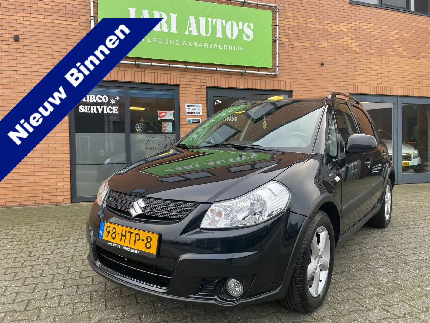 Suzuki SX4 1.6 Shogun Weinig km! Zwart - 1