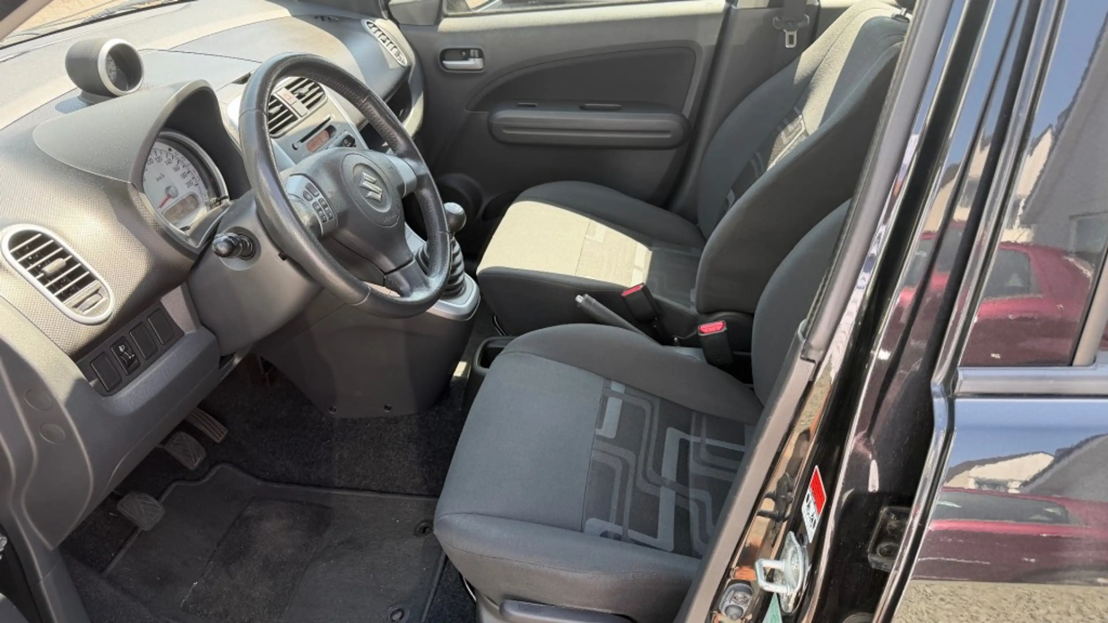 Suzuki Splash 1.0 VVT Comfort — photo 5