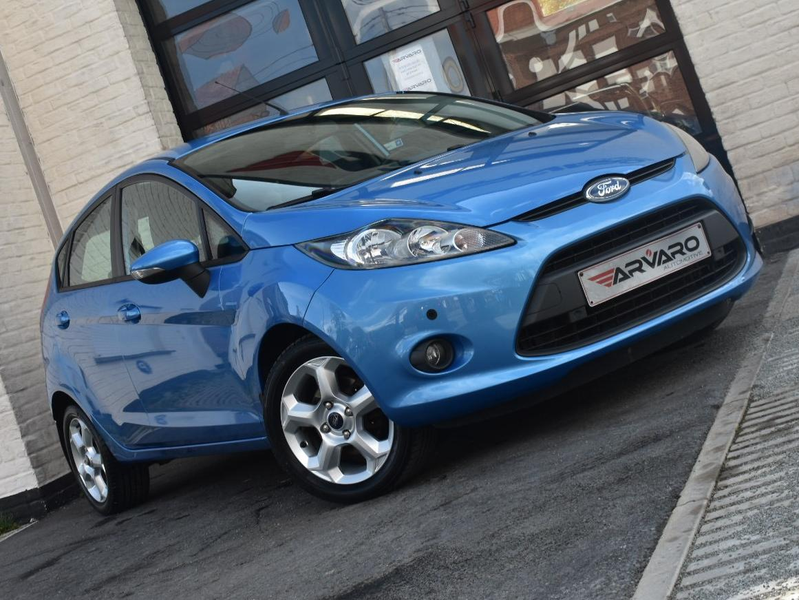 Ford Fiesta 1.4i Titanium / PDC / Verw Zetels / Airco / Garantie — photo 6