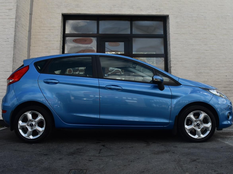 Ford Fiesta 1.4i Titanium / PDC / Verw Zetels / Airco / Garantie — photo 7