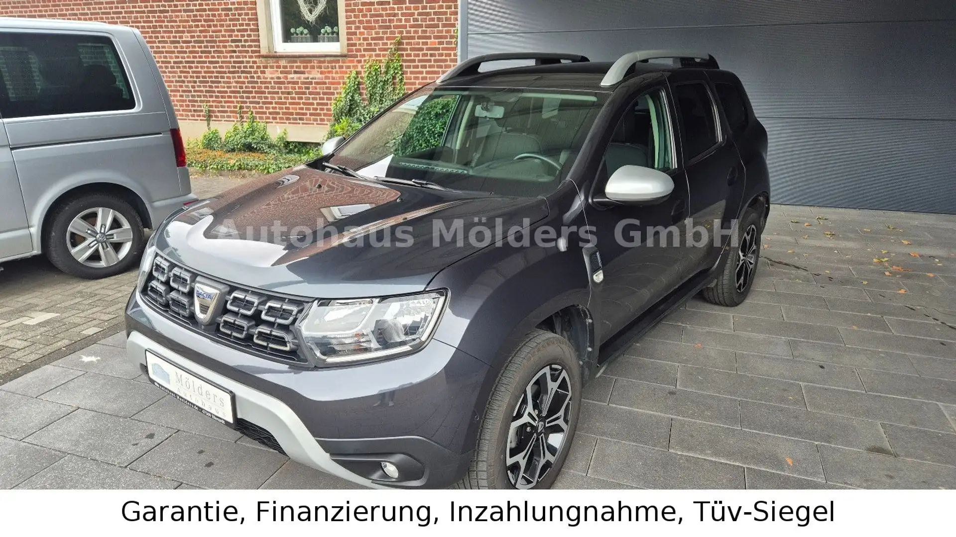 Dacia Duster *Garantie*Navi*AHK*189€ mtl. Grau - 1
