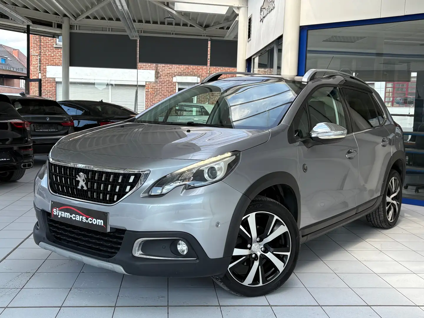 Peugeot 2008 1.6 BlueHDi *CROSSWAY * PANO * GPS * CUIR * PDC * Grijs - 1