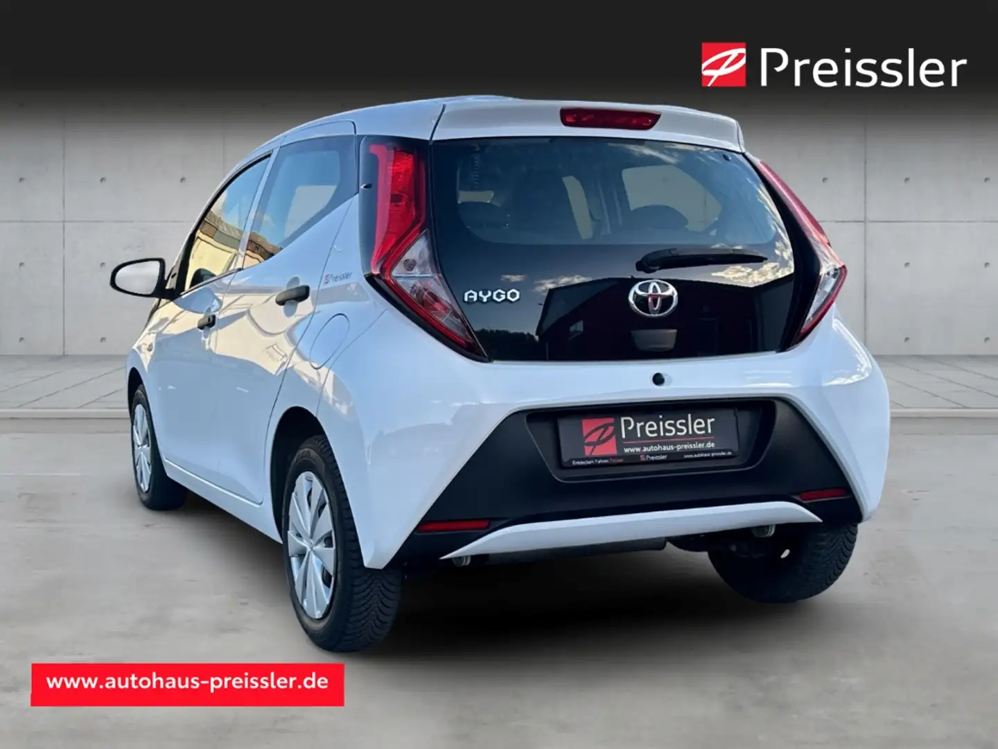 Toyota Aygo 1,0 x-business DAB Tel.-Vorb. Berganfahrass. GA Kl Weiß - 2