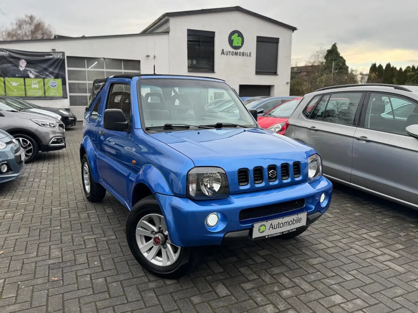 Suzuki Jimny Club Rock am Ring Cabrio*SHZ*PDC*AHK*4S-RE Blau - 1