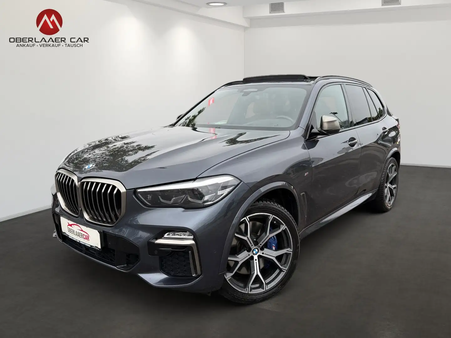 BMW X5 M M50 d Aut. | Panoramadach Sky Lounge | Led | Grau - 1