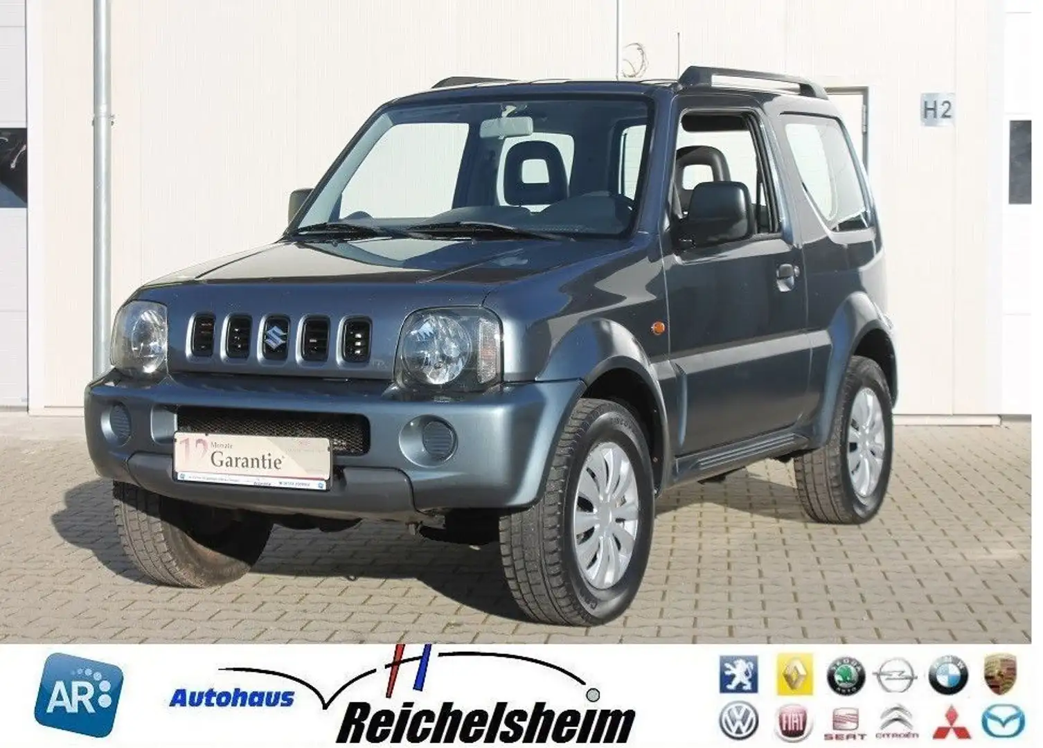 Suzuki Jimny Tüv/Au neu,Klima,AHK,4x4,gepfl,Finanz. Grau - 1