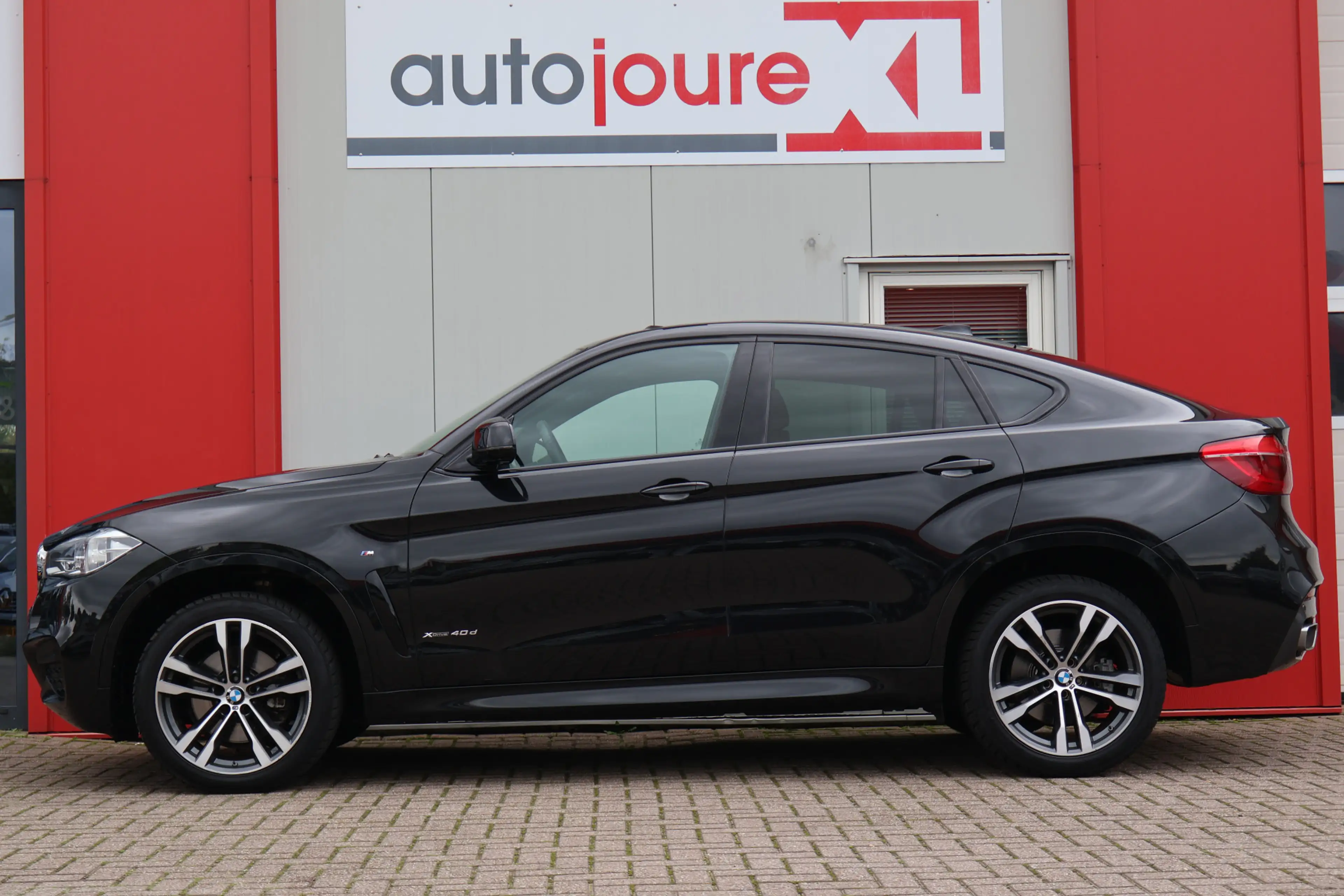 BMW X6 xDrive40d High Executive — photo 3