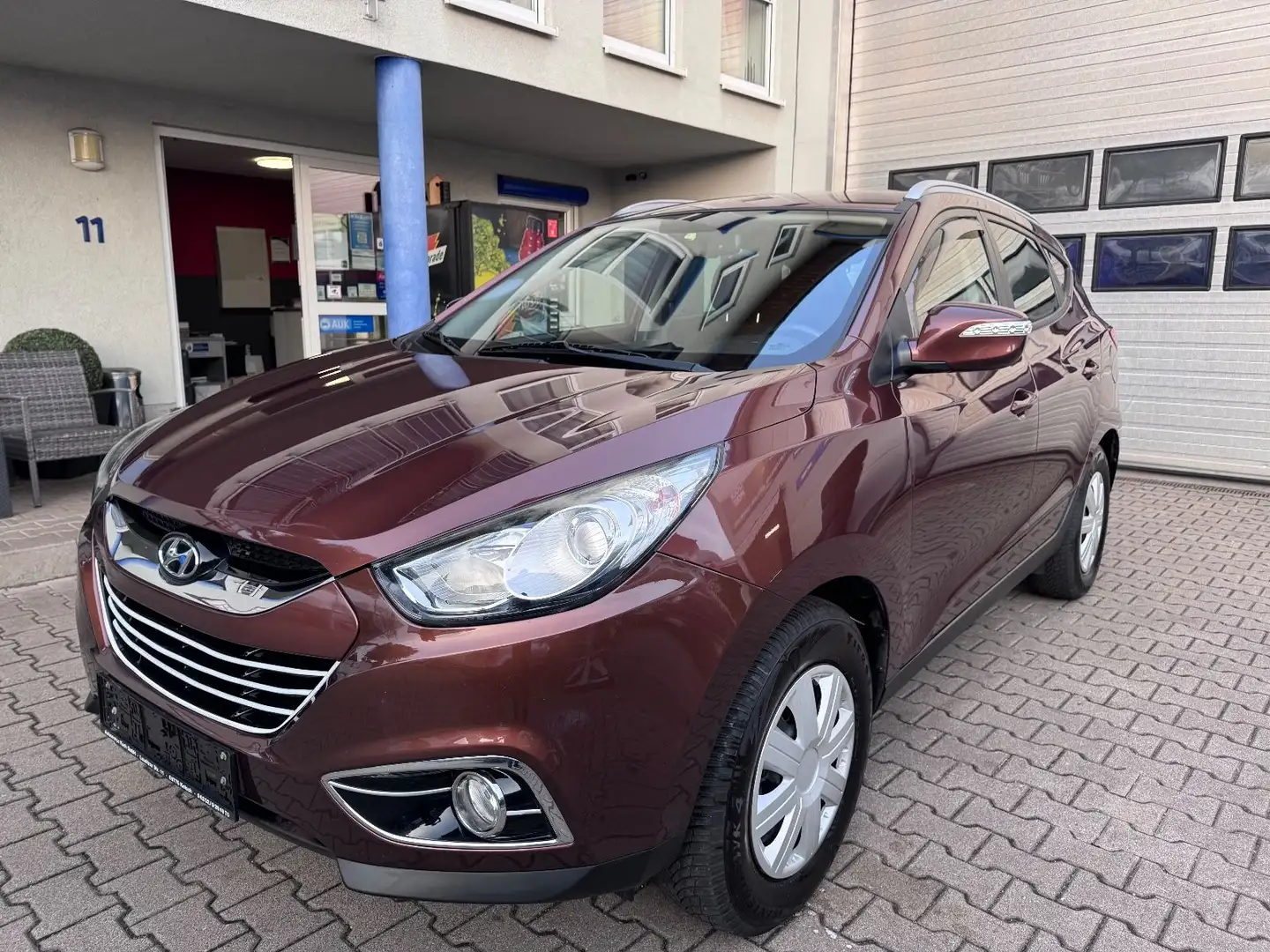 Hyundai iX35 Comfort 2WD Finanzierung Garantie Bruin - 1