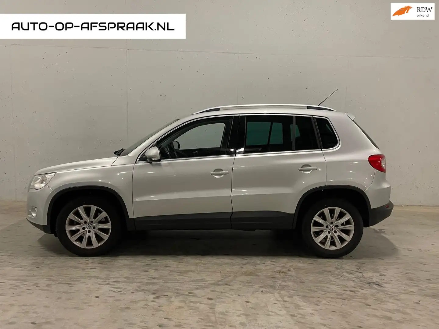 Volkswagen Tiguan 1.4 TSI Sport&Style 4Motion Navi Clima Cruise Grijs - 1