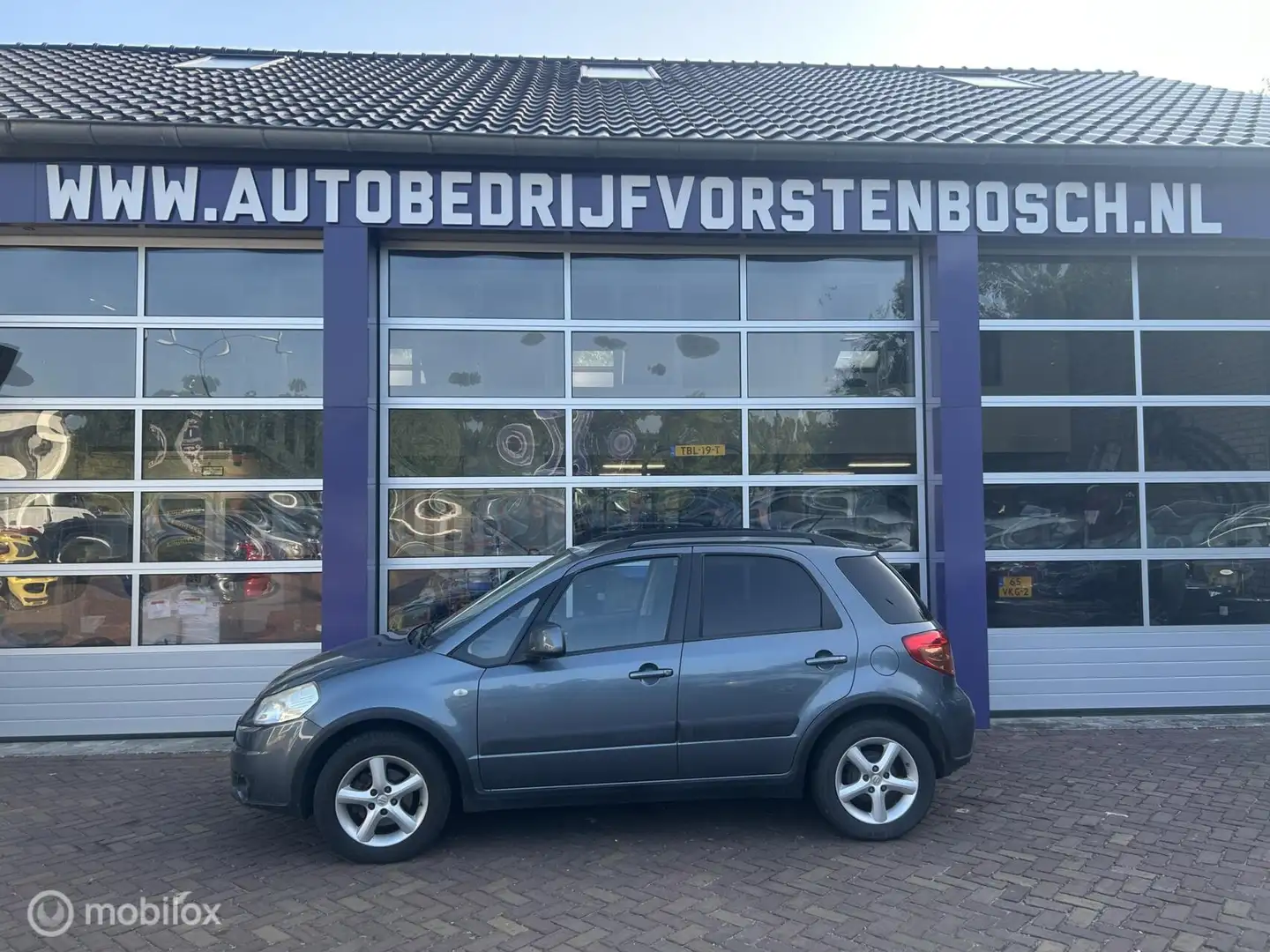 Suzuki SX4 1.6 Comfort * AIRCO * TREKHAAK * LM * METALLIC Grijs - 2