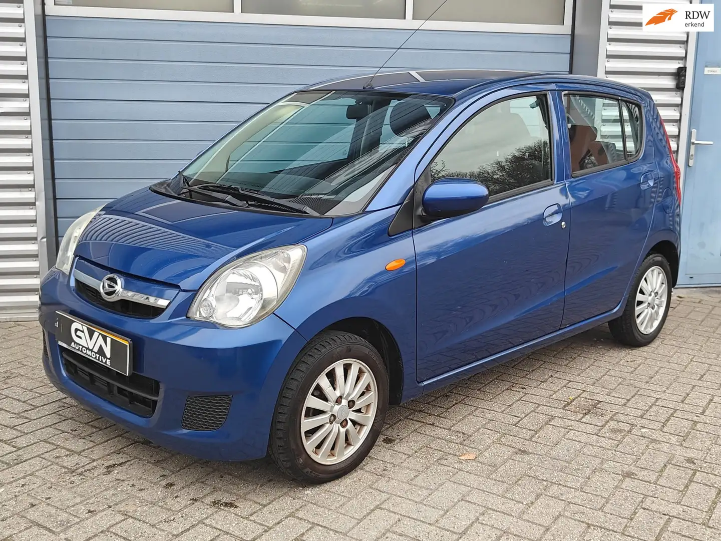 Daihatsu Cuore 1.0 Premium | 1e Eigenaar | NAP 101.000 km | Airco Blau - 1