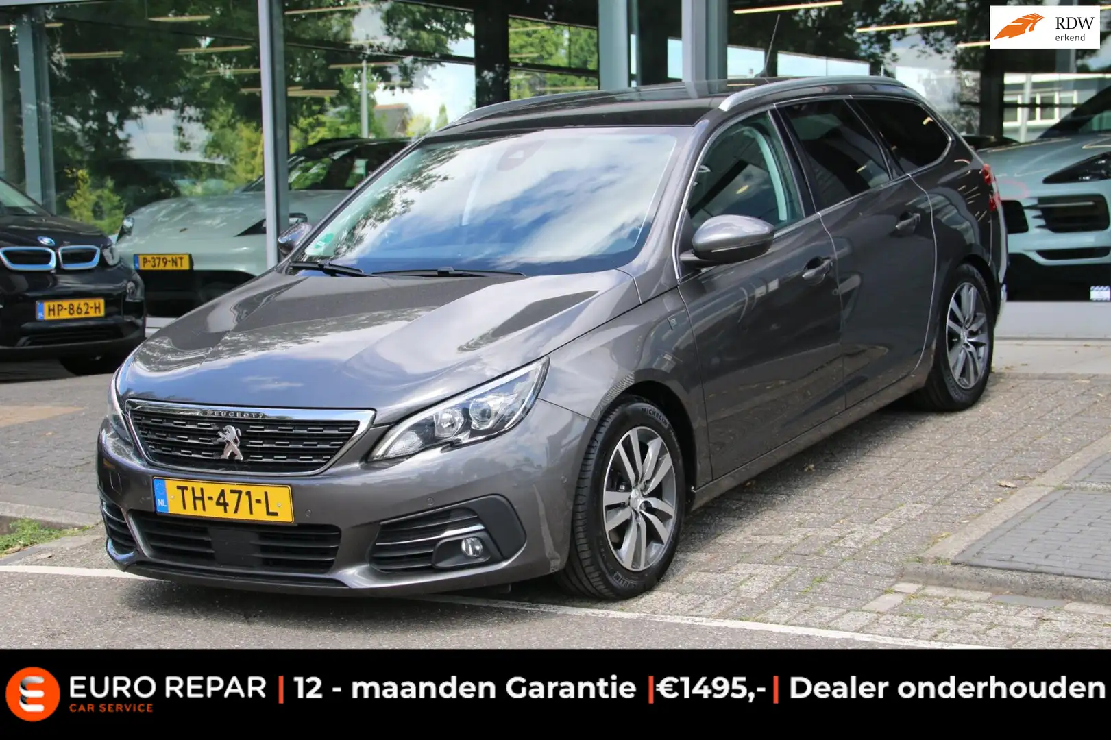 Peugeot 308 SW 1.2 PureTech Tech Edition PANO-DAK + WINTERSET! Grijs - 1
