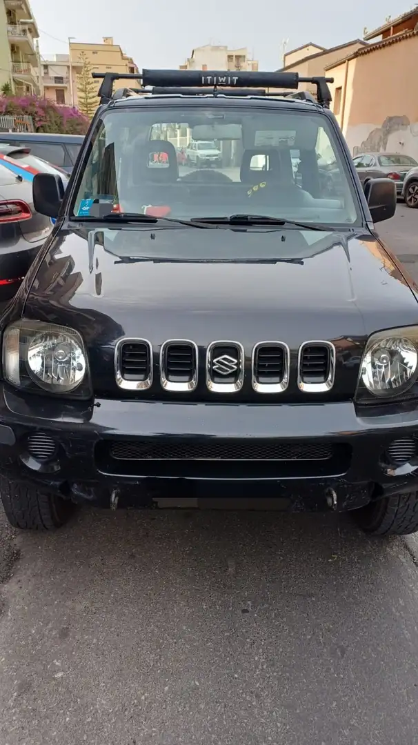 Suzuki Jimny 1.3 16v JLX 4wd E3 Negro - 2