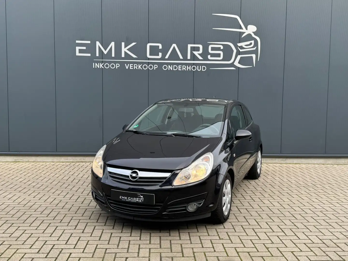 Opel Corsa 1.2-16V Enjoy Zwart - 1