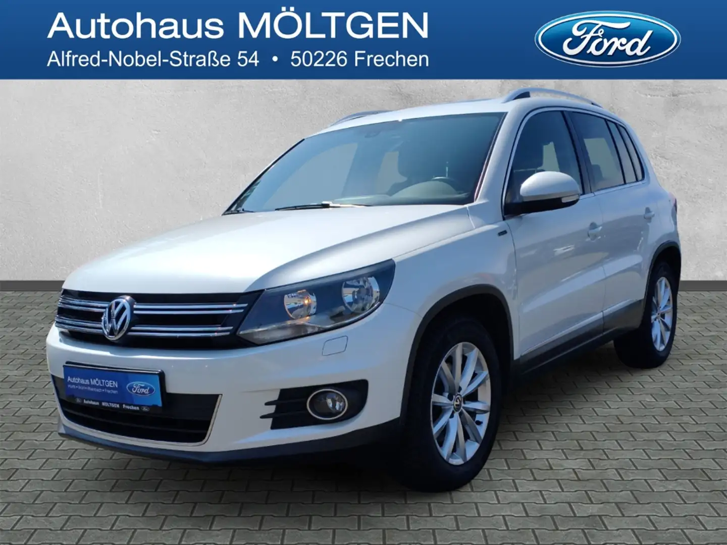 Volkswagen Tiguan Lounge Sport & Style BMT 1.4 TSI *Navi*PDC*SHZ*RFK Wit - 1