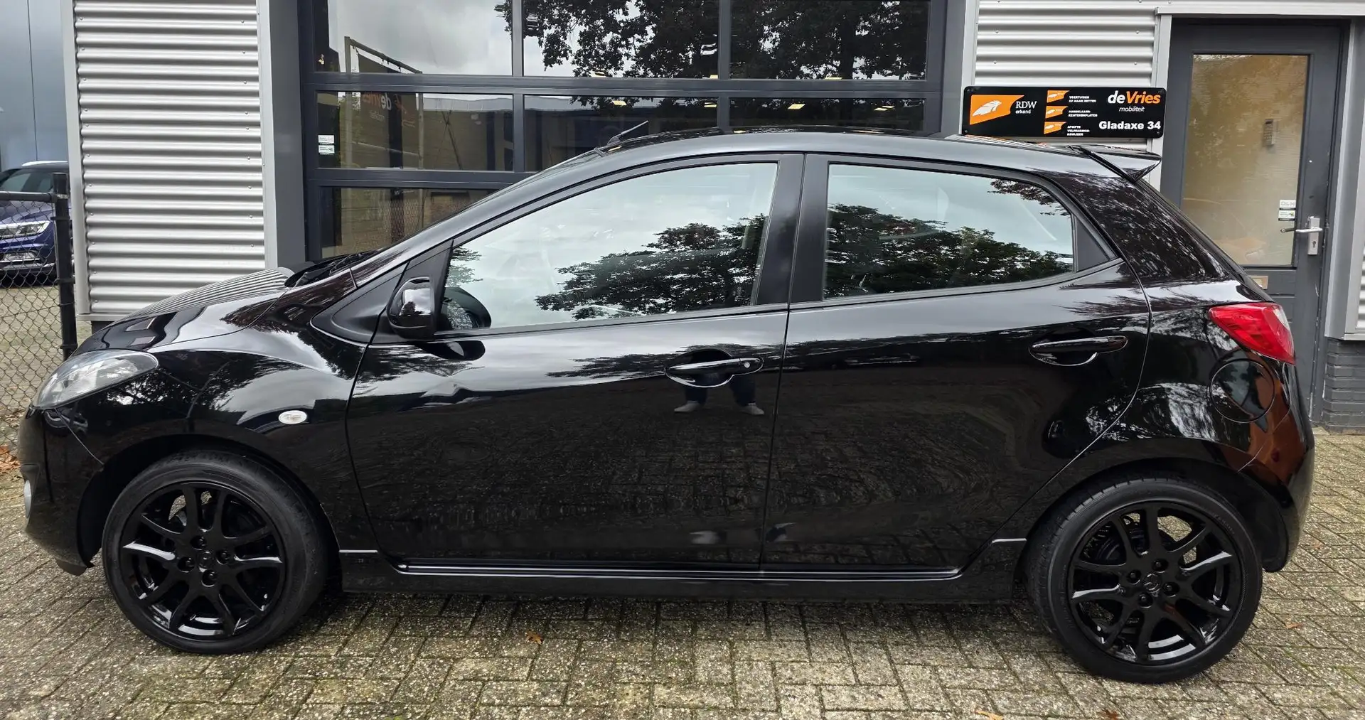 Mazda 2 1.5 GT-M **5DRS-AIRCO-CRUISECTRL** Zwart - 2