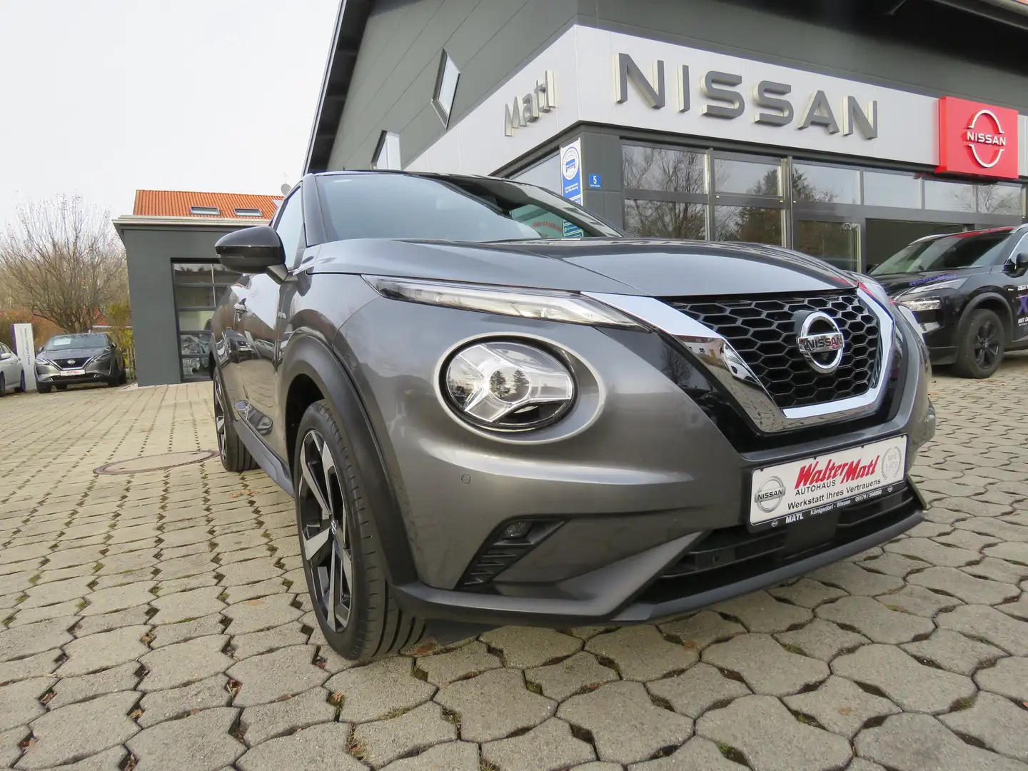 Nissan Juke Tekna 1,0 DIG-T 114PS 6MT Navi, Bose Gris - 1