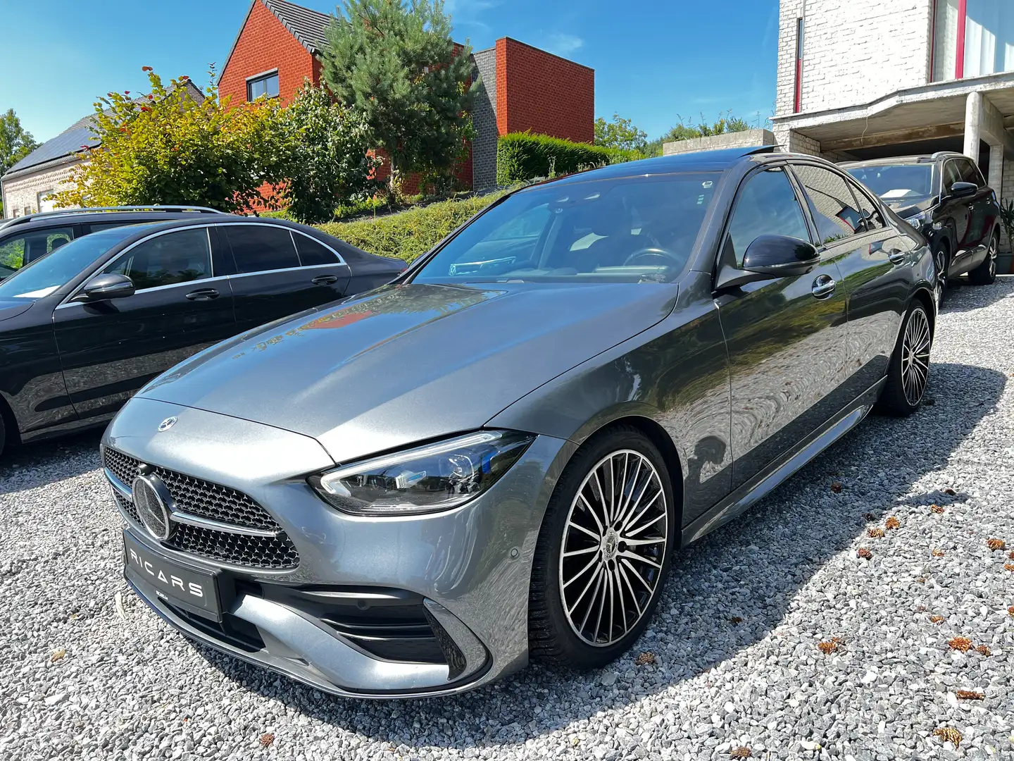 Mercedes-Benz C 200 AMG Line Shadow Pano Carnet FULL OPTIONS GARANTIE Grijs - 1