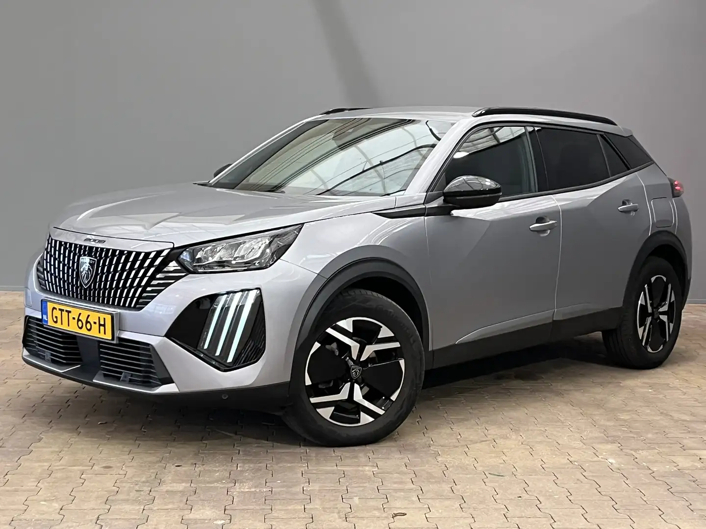 Peugeot 2008 1.2 PureTech Allure Automaat | Apple Carplay/Andro Gris - 1